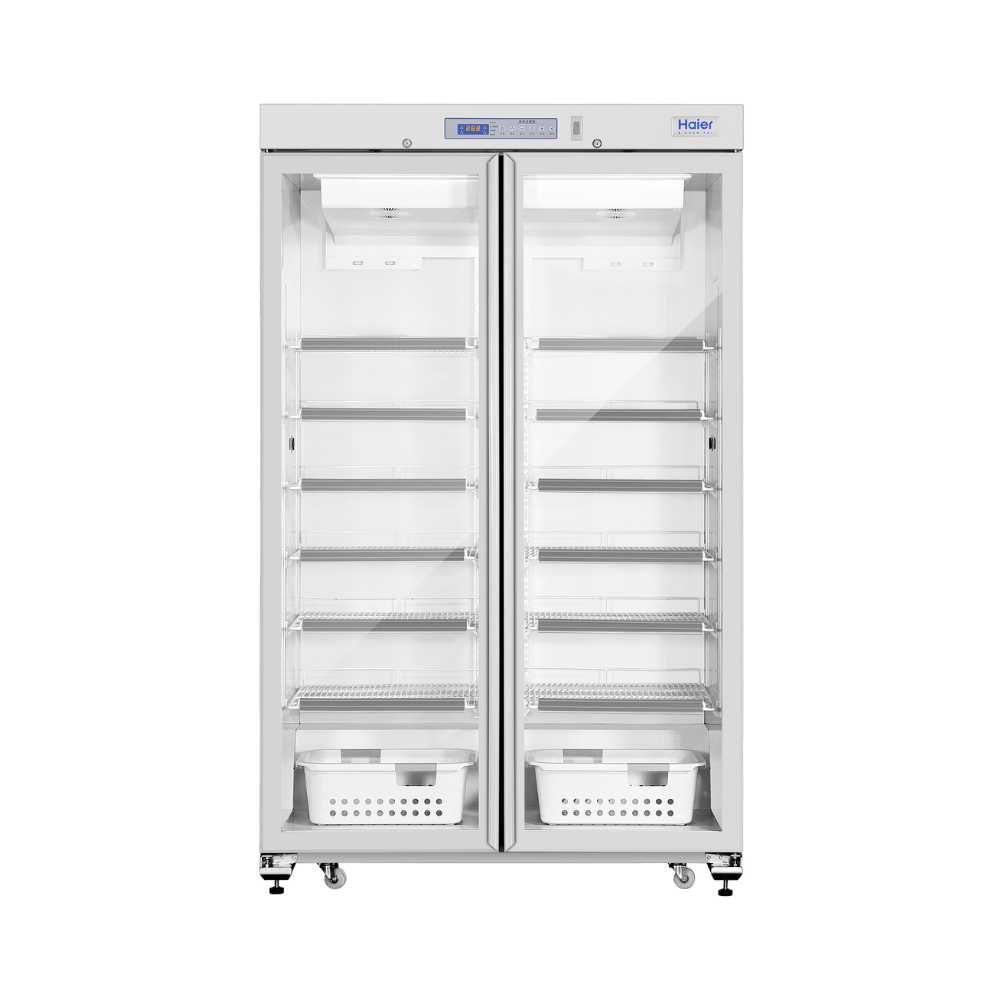 Haier HYC-1031GD Pharmacy Refrigerator with double glass doors and multiple adjustable shelves for medical storage.