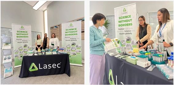 Lasec team engaging with attendees at the UCT IDM event, showcasing laboratory products and science without borders initiative.
